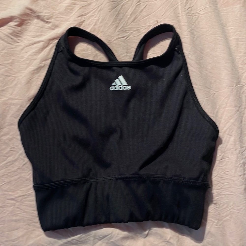 Small brand new black adidas primegreen sports bra. To small for me.